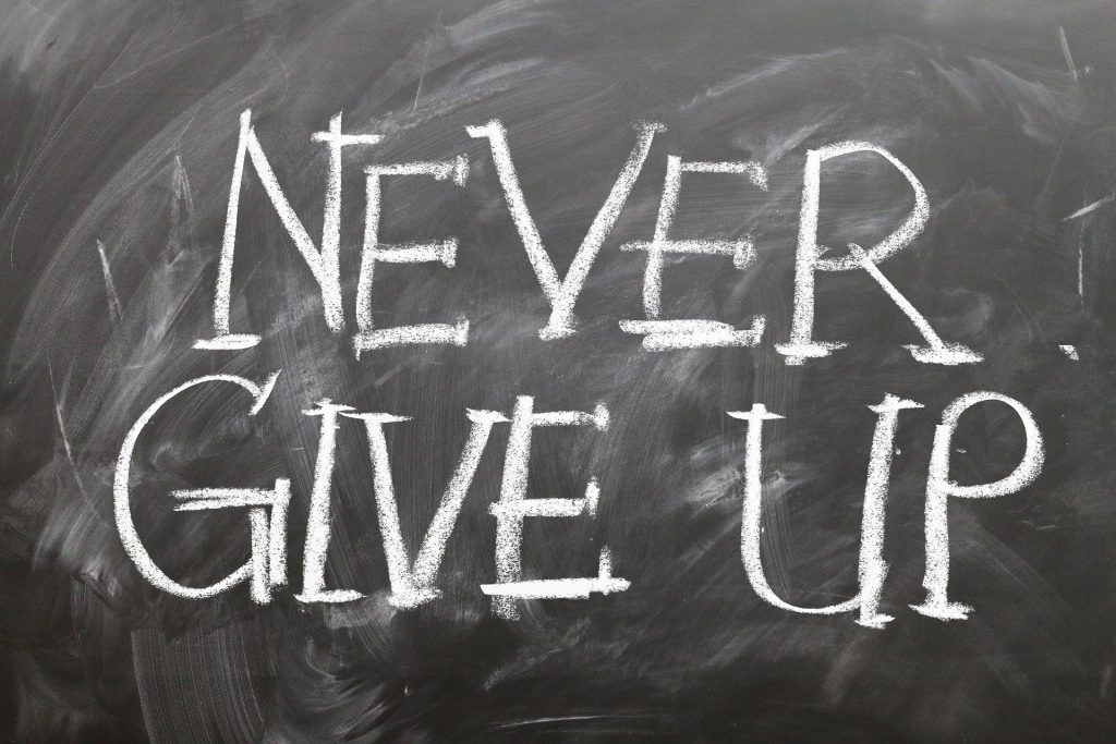 Chalkboard with Never Give Up written